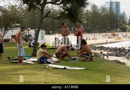 Surfers relaxing at Burleigh Head, Gold Coast, Queensland Stock Photo