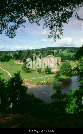 Ruins of Bolton Priory seen over River Wharfe, Wharfedale, Yorkshire Dales National Park, North Yorkshire, England, UK. Stock Photo