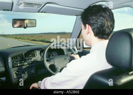 Man driving 1996 Vokswagen Golf Gti Stock Photo