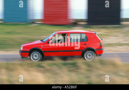 Man driving 1996 Vokswagen Golf Gti Stock Photo