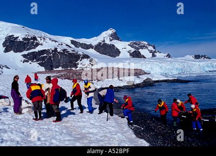 people, tourists, boat tour, zodiac, wet landing, guide guided tour, Cuverville Island, Errera Channel, Antarctic Peninsula, Antarctica Stock Photo