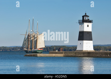 Three Masted Schooner Denis Sullivan Sailing On Lake Erie Past Erie Pierhead Light Near Presque Isle State Park Pennsylvania Stock Photo