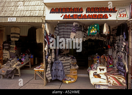 sweaters, shirts, ponchos, warm clothes, warm clothing, woolen clothes, woolen clothing, souvenirs, clothing store, Puerto Montt, Chile, South America Stock Photo