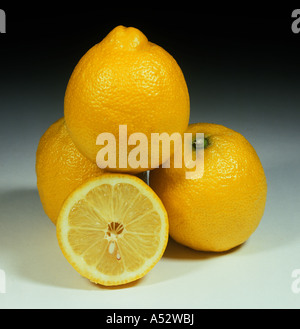 Whole sectioned lemon fruit variety Lisbon Stock Photo