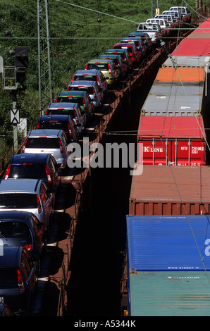 Container and car (Ford) transporter trains running on a loop around the city of Cologne, North Rhine-Westphalia, Germany. Stock Photo