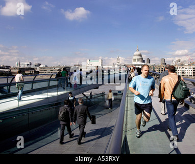 People on the Millennium Bridge, London, Great Britain Stock Photo