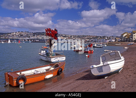 Boats resting on a beach after being out at sea all day ...