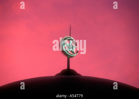 Islamic muslim crescent on top of mosque dome in Java Indonesia Southeast Asia Stock Photo