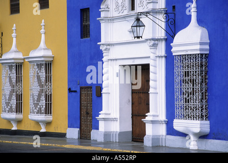 Colonial doors and window grilles on mansions, Plaza de Armas, Trujillo, Peru