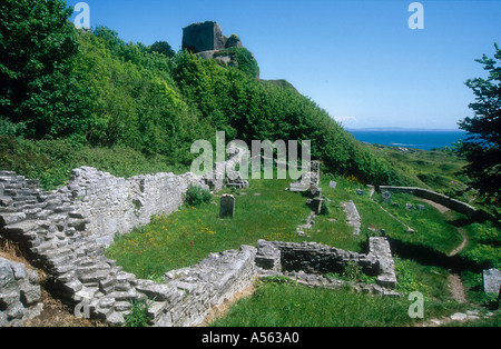 c15th Rufus or Bow and Arrow Castle and ruins of c13th St Andrews Church at Portland Dorset England UK Stock Photo