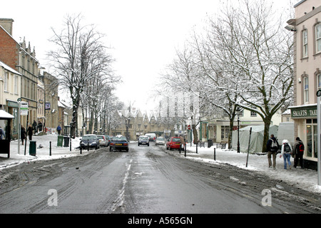 People walking in the snow in Witney Oxfordshire England. Stock Photo