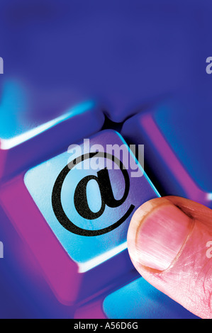 finger pressing online internet computer key Stock Photo