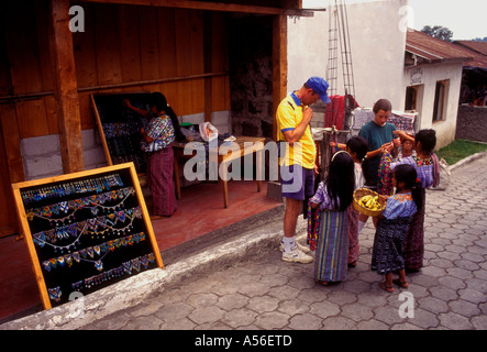 Guatemalan girls street vendors selling to tourists in the town of Santiago Atitlan Solola Department Guatemala Central America Stock Photo