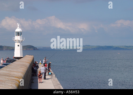 Sea fishing, Sea wall, Lighthouse, Harbour, Mevagissey, Cornwall, England, UK, Europe Stock Photo