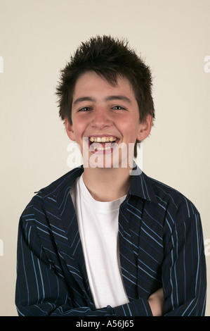 13 year old boy poses for photograph England Stock Photo