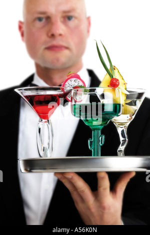 Barkeeper serving cocktails, close-up Stock Photo