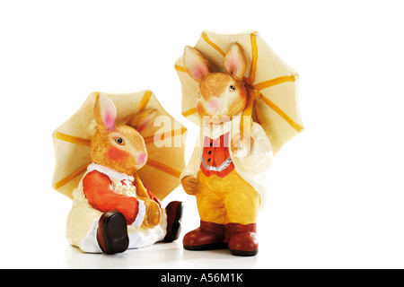 Easter bunnies holding umbrella Stock Photo