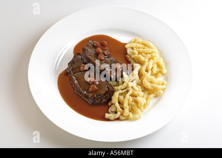 Roast beef with side dish, typical of Rheinland, Germany Stock Photo