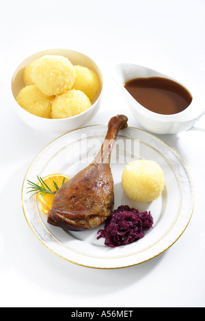 Roast goose with side dishes, elevated view Stock Photo