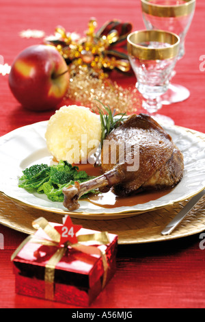 Roast goose with side dishes and christmas dekoration Stock Photo