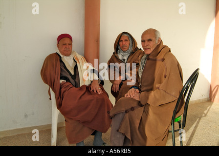 Tunisian men chatting in a cafe, Matmata, Tunisia Stock Photo
