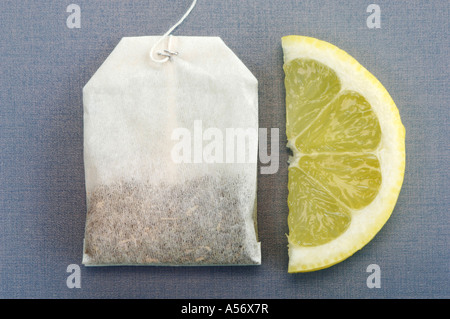Tea bag and slice of lemmon Stock Photo