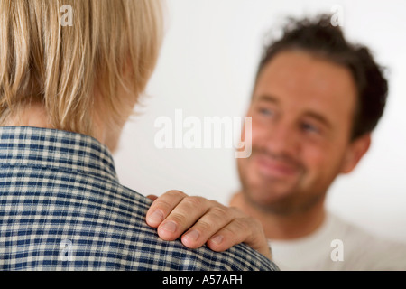 Father with son (16-17), close-up (focus on foreground) Stock Photo