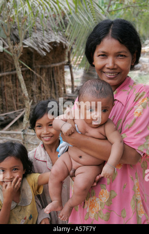 Painet je2206 cambodia mother children kids kampot province 2006 child kid woman female women females smile family country Stock Photo