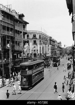 double decker tram on city road Pydhonie Bombay Mumbai Maharashtra India 1952 old vintage 1900s picture Stock Photo