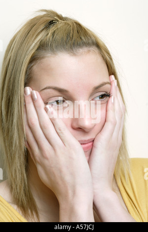 Surprised young woman, close-up Stock Photo