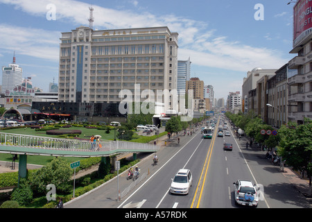 Painet jf5466 china street scene downtown area kunming yunnan province asia far east urban modern architecture traffic Stock Photo