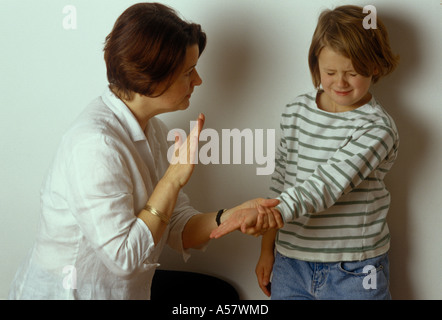 woman smacking child Stock Photo - Alamy