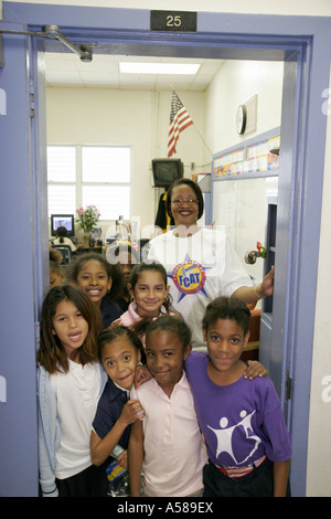 Miami Florida,Liberty City,Lenora Smith Elementary School,campus,public education,low income,poverty,neighborhood,residential Black woman female women Stock Photo