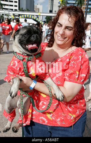 Miami Florida,Bayfront Park,Purina Walk for the Animals,fundraiser,corporate,sponsor animal,Hispanic woman female women,matching outfits,pug,dog,pet,c Stock Photo