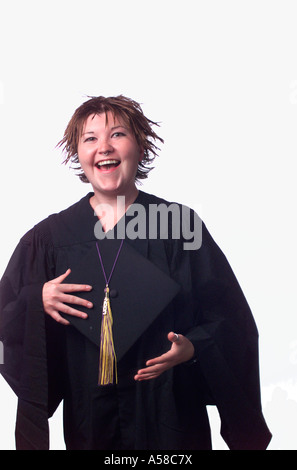Portrait of a recent graduate in cap and gown Stock Photo