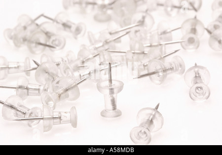 Pile of transparent plastic map pins on white background Stock Photo