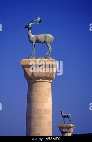 Bronze Statues of deer at the entrance to Mandraki Harbour Rhodes Island Greece.  XPL 4859-456 Stock Photo