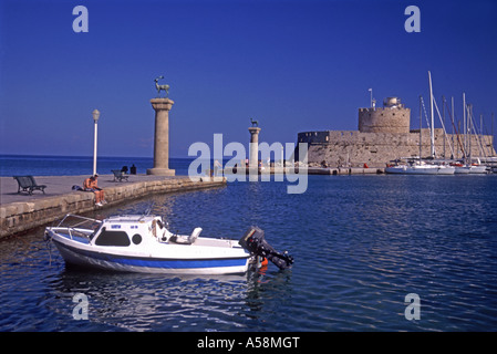 Mandraki harbor Rhodes, Greece where once the Colossus of Rhodes statue may have stood.  XPL 4864-456 Stock Photo