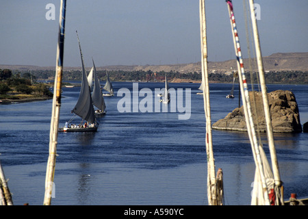 ship felucca boats on the Nile River Aswan Upper Egypt Egypt North Africa Stock Photo