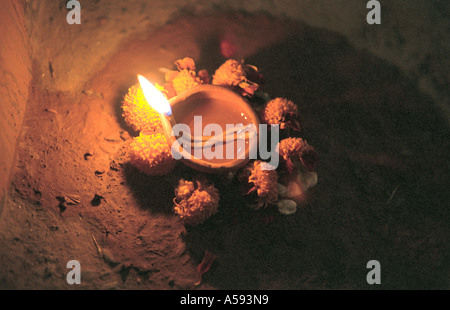 Burning oil lamp on street at Tihar Fistival of Lights third day Deepawali inviting Goddess of Wealth to homes in Nepal Stock Photo