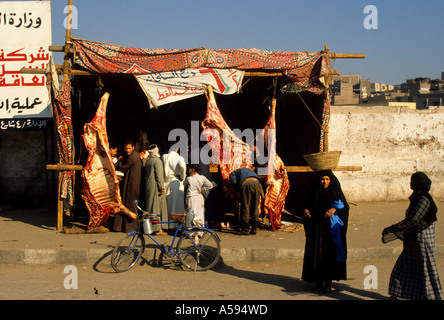 Butcher Camel Camels Asyut Egypt Egyptian Market town city Nile Desert Stock Photo