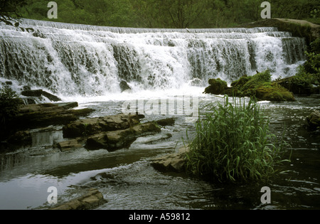 WEIR IN MONSAL DALE PEAK DISTRICT NATIONAL PARK ENGLAND Stock Photo