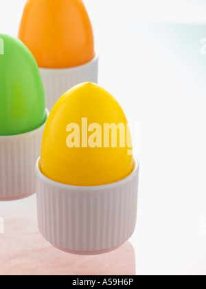Easter Eggs in White Eggcups Stock Photo