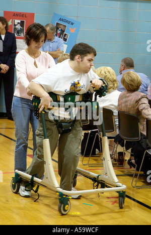 MOVE International holds ceremony and demonstration of Pacer Gait Trainer to aid students to learn to walk Stock Photo