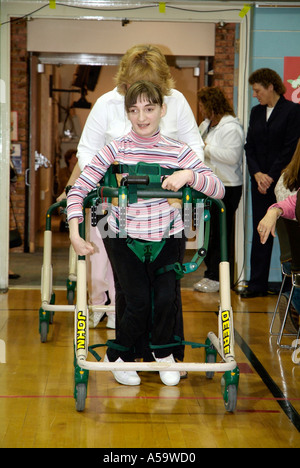 MOVE International holds ceremony and demonstration of Pacer Gait Trainer to aid students to learn to walk Stock Photo