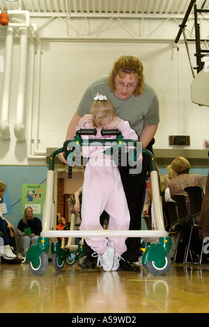 MOVE International holds ceremony and demonstration of Pacer Gait Trainer to aid students to learn to walk Stock Photo