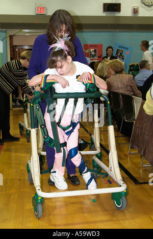 MOVE International holds ceremony and demonstration of Pacer Gait Trainer to aid students to learn to walk Stock Photo