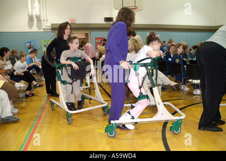 MOVE International holds ceremony and demonstration of Pacer Gait Trainer to aid students to learn to walk Stock Photo