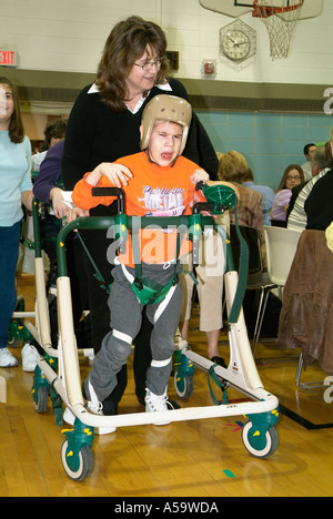 MOVE International holds ceremony and demonstration of Pacer Gait Trainer to aid students to learn to walk Stock Photo