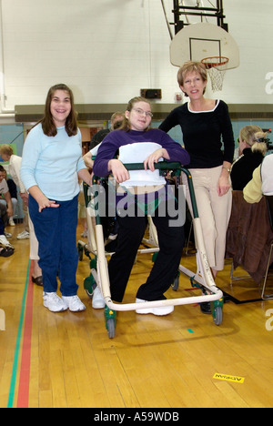 MOVE International holds ceremony and demonstration of Pacer Gait Trainer to aid students to learn to walk Stock Photo